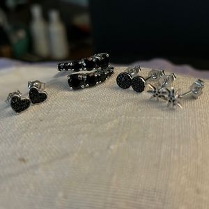 Set of sterling silver black spinel ring size 7 and three Pierced earrings